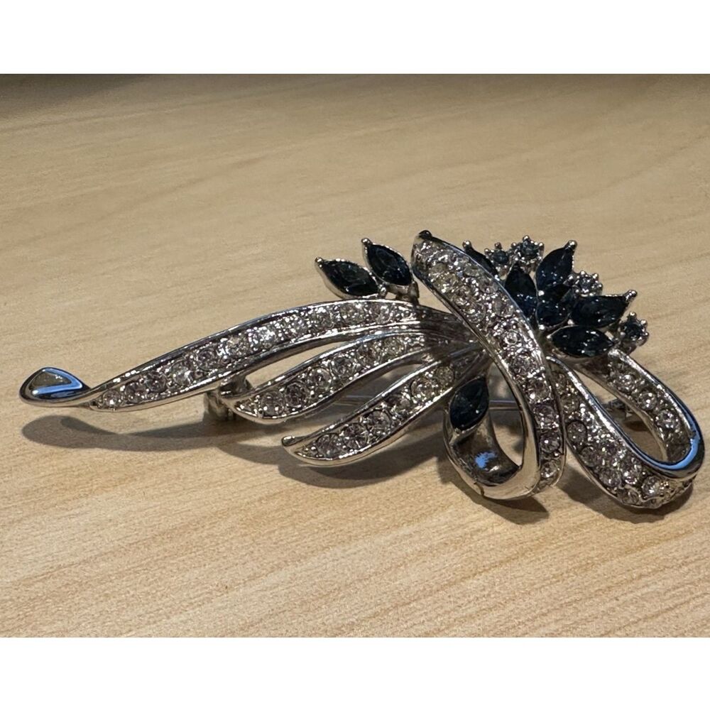 Vintage Silver Tone Sapphire Blue Clear Rhinestone Ribbon Spray Floral Brooch Pi